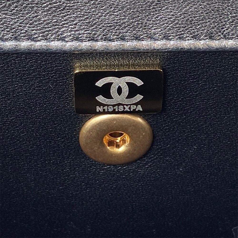 MINI FLAP BAG WITH TOP HANDLE