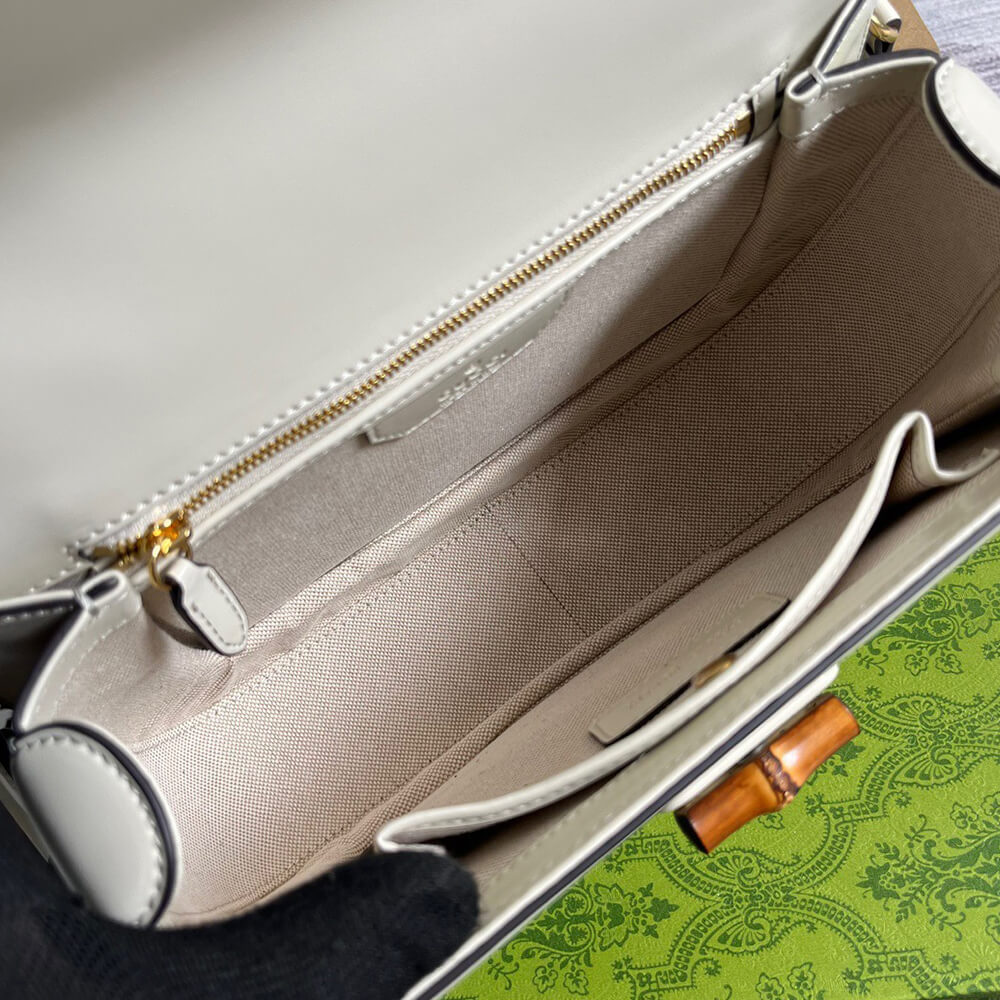 G*u*i bamboo 1947 medium top handle bag